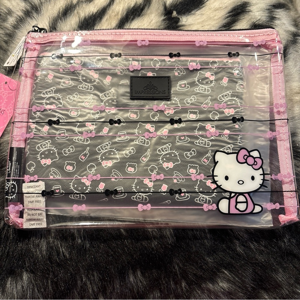 Impressions Hello Kitty Pink and Black Pouch